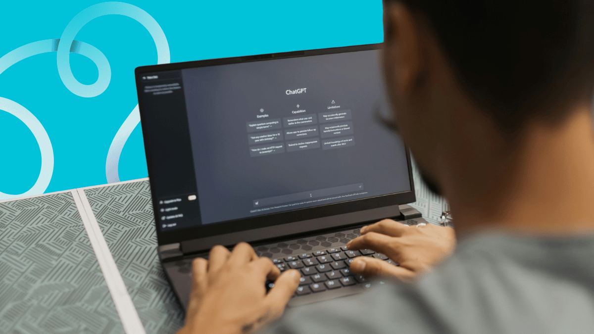 Person using ChatGPT on a laptop